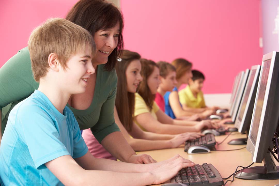 Students working in a computer lab.