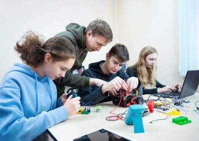 students working on robotics project at school