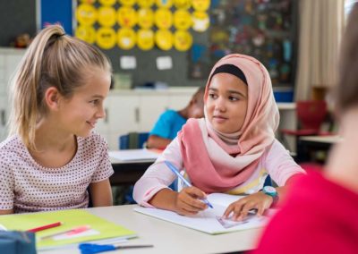 two students working in class