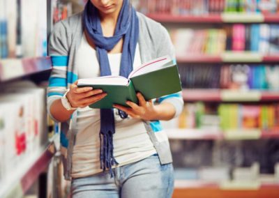 Reading book in library